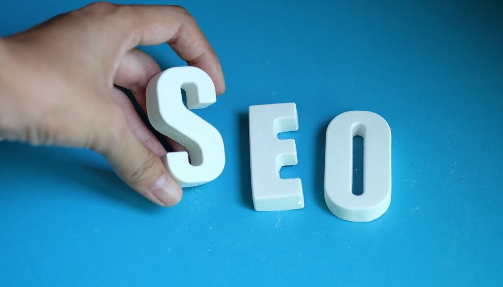 Hand arrange white letters as SEO